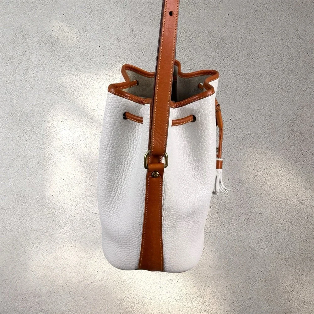 Dooney & Bourke Vintage White Tan Leather Drawstring Bucket Bag AWL Tassel USA